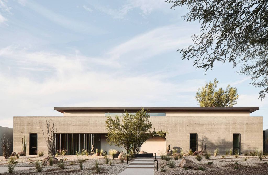 Foo House in Phoenix, Arizona was designed by The Ranch Mine in Modern desert style; this house designed for both pleasure and production. This home located on beautiful lot with amazing views and wonderful outdoor living spaces including patio, pool, garden