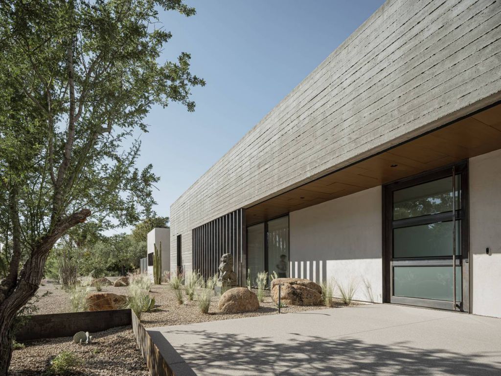 Foo House in Phoenix, Arizona was designed by The Ranch Mine in Modern desert style; this house designed for both pleasure and production. This home located on beautiful lot with amazing views and wonderful outdoor living spaces including patio, pool, garden