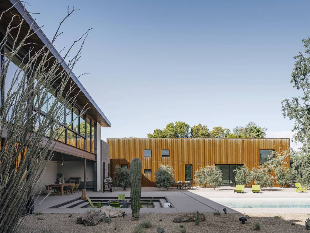 Foo House in Phoenix, Arizona was designed by The Ranch Mine in Modern desert style; this house designed for both pleasure and production. This home located on beautiful lot with amazing views and wonderful outdoor living spaces including patio, pool, garden