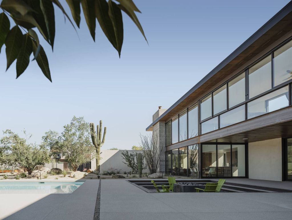 Foo House in Phoenix, Arizona was designed by The Ranch Mine in Modern desert style; this house designed for both pleasure and production. This home located on beautiful lot with amazing views and wonderful outdoor living spaces including patio, pool, garden