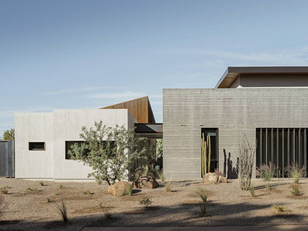 Foo House in Phoenix, Arizona was designed by The Ranch Mine in Modern desert style; this house designed for both pleasure and production. This home located on beautiful lot with amazing views and wonderful outdoor living spaces including patio, pool, garden