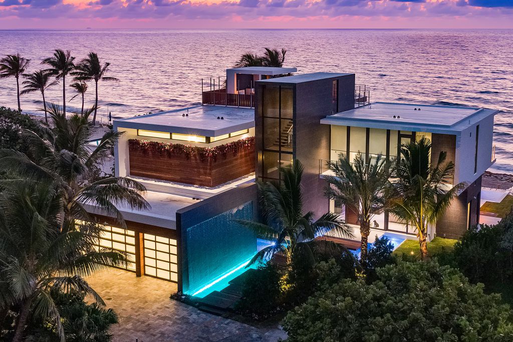 This Oceanfront Home in South Palm Beach, Florida was designed by Choeff Levy Fischman in tropical modern style with 5 bedrooms and 5 bathrooms; this house offers luxurious living with high end finishes and smart amenities. This home located on beautiful lot with amazing sea views and wonderful outdoor living spaces including patio, pool, garden.
