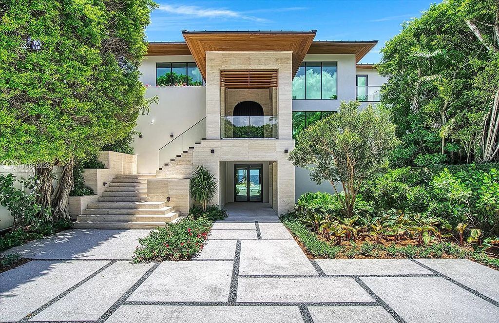 The Florida Mansion is a tropical modern residence in 24 hour Anchorage guard gated community now available for sale. This home located at 3525 Anchorage Way, Miami, Florida; offering 7 bedrooms and 8 bathrooms with over 9,000 square feet of living spaces.