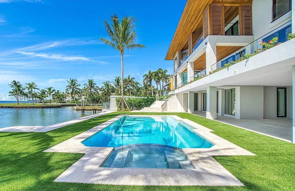 The Florida Mansion is a tropical modern residence in 24 hour Anchorage guard gated community now available for sale. This home located at 3525 Anchorage Way, Miami, Florida; offering 7 bedrooms and 8 bathrooms with over 9,000 square feet of living spaces.