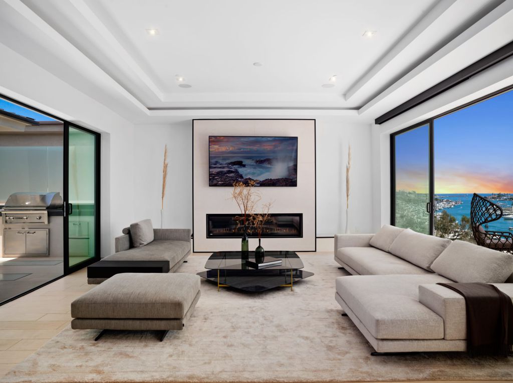 The California House is a stunning example of modern luxury and flawless contemporary design now available for sale. This home located at 1207 Dolphin Ter, Corona Del Mar, California; offering 6 bedrooms and 8 bathrooms with over 7,700 square feet of living spaces.