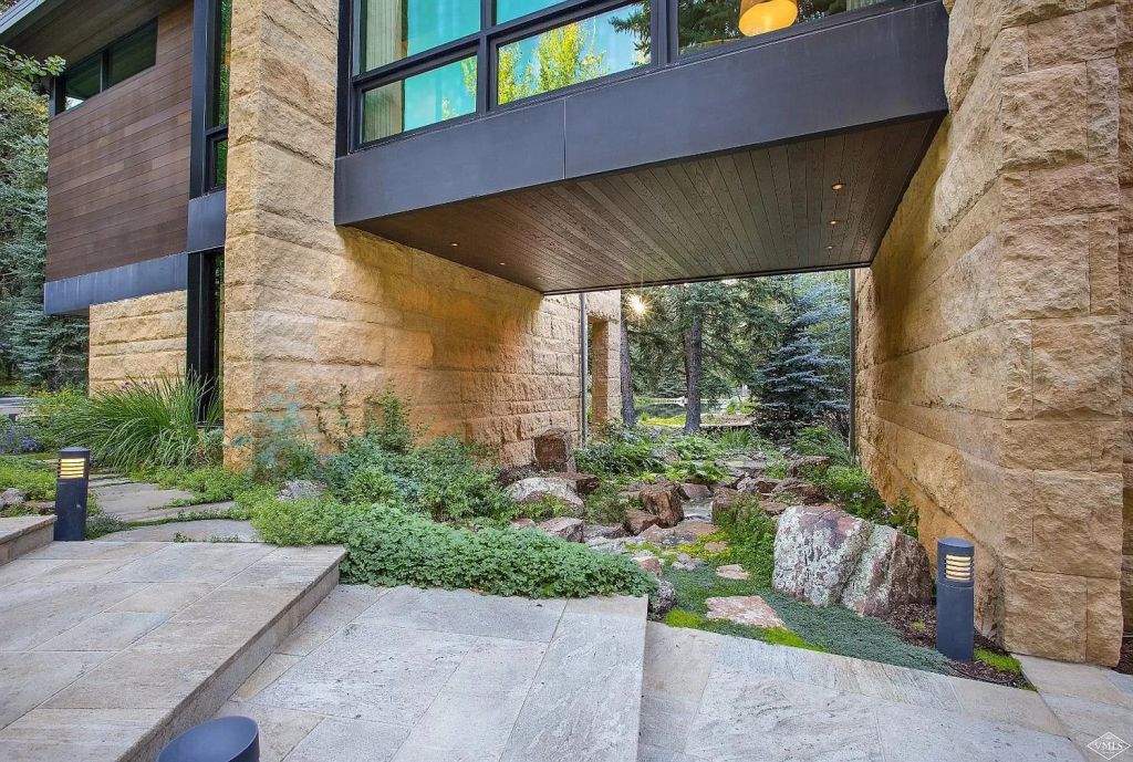 The Home in Vail is a masterpiece of architectural and interior design of voluminous spaces, massive glass now available for sale. This home located at 333 Beaver Dam Rd, Vail, Colorado; offering 6 bedrooms and 10 bathrooms with over 11,000 square feet of living spaces.
