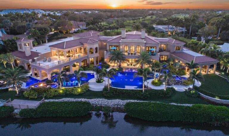 Magnificent Jupiter Mansion boasts over 365′ of Prime Protected Waterfrontage for a Mega Yacht