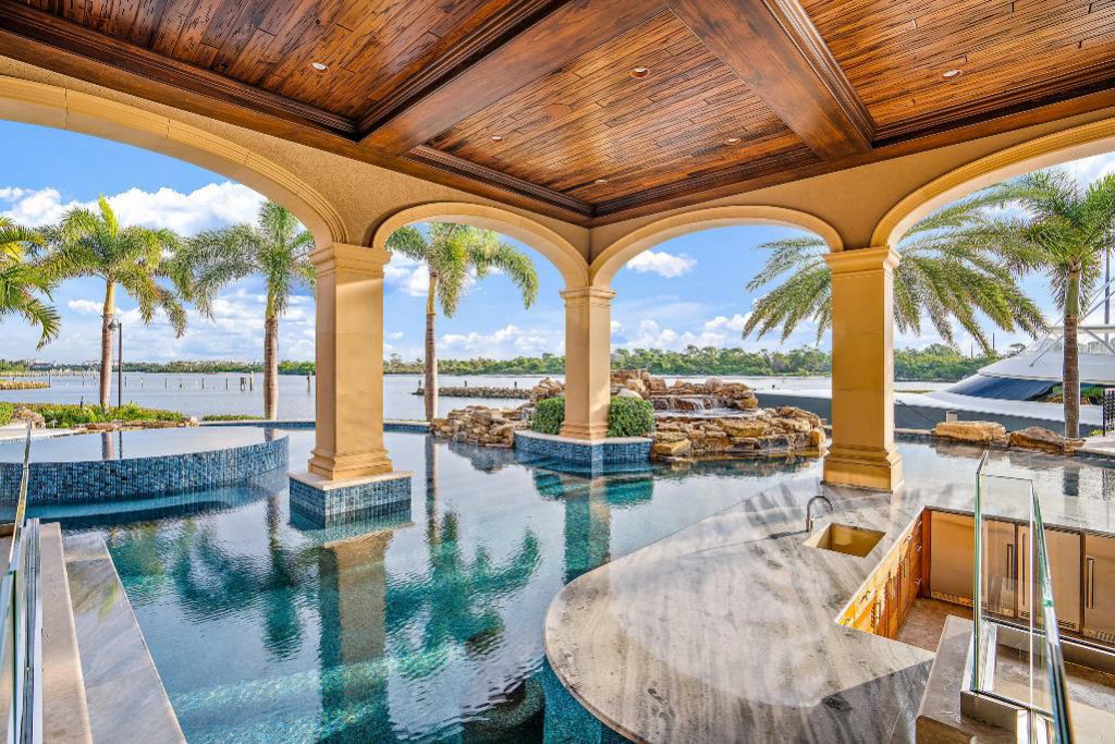 The Jupiter Mansion is the largest Intracoastal property in Admirals Cove boasts over 365' of prime protected waterfrontage for a Mega Yacht now available for sale. This home located at 176 Spyglass Ln, Jupiter, Florida; offering 6 bedrooms and 10 bathrooms with over 16,700 square feet of living spaces.