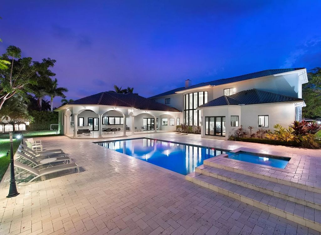 The Pinecrest Home is a classic and superior architectural design property with exquisite, finest modern finishes and details now available for sale. This home located at 13000 SW 63rd Ave, Pinecrest, Florida; offering 6 bedrooms and 8 bathrooms with over 8,800 square feet of living spaces.