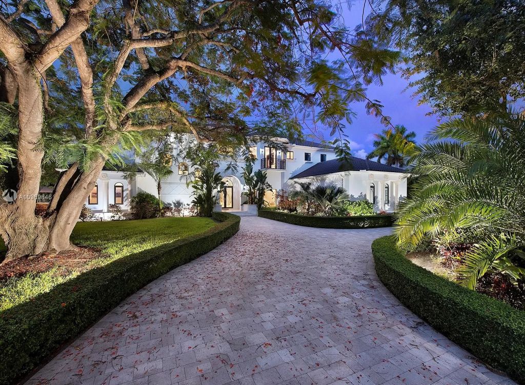 The Pinecrest Home is a classic and superior architectural design property with exquisite, finest modern finishes and details now available for sale. This home located at 13000 SW 63rd Ave, Pinecrest, Florida; offering 6 bedrooms and 8 bathrooms with over 8,800 square feet of living spaces.