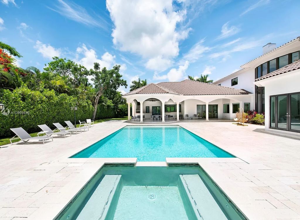 The Pinecrest Home is a classic and superior architectural design property with exquisite, finest modern finishes and details now available for sale. This home located at 13000 SW 63rd Ave, Pinecrest, Florida; offering 6 bedrooms and 8 bathrooms with over 8,800 square feet of living spaces.