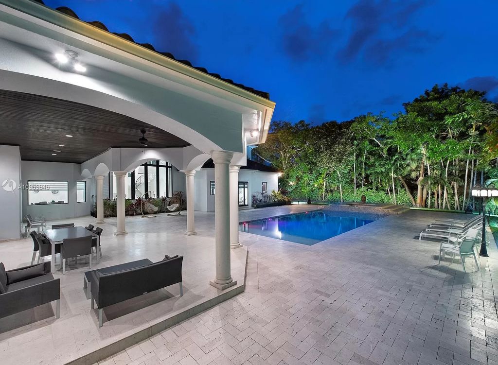 The Pinecrest Home is a classic and superior architectural design property with exquisite, finest modern finishes and details now available for sale. This home located at 13000 SW 63rd Ave, Pinecrest, Florida; offering 6 bedrooms and 8 bathrooms with over 8,800 square feet of living spaces.