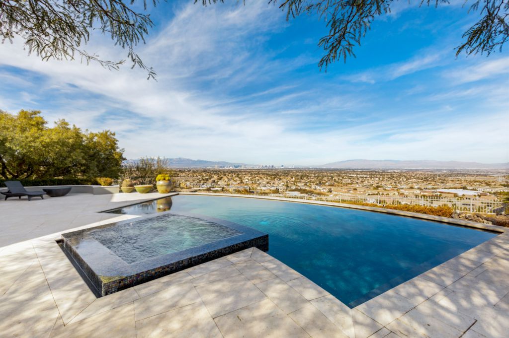 The Henderson House is a luxurious property with almost every room features unobstructed views now available for sale. This home located at 1508 View Field Ct, Henderson, Nevada; offering 4 bedrooms and 8 bathrooms with over 7,600 square feet of living spaces.