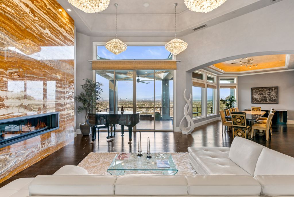 The Henderson House is a luxurious property with almost every room features unobstructed views now available for sale. This home located at 1508 View Field Ct, Henderson, Nevada; offering 4 bedrooms and 8 bathrooms with over 7,600 square feet of living spaces.