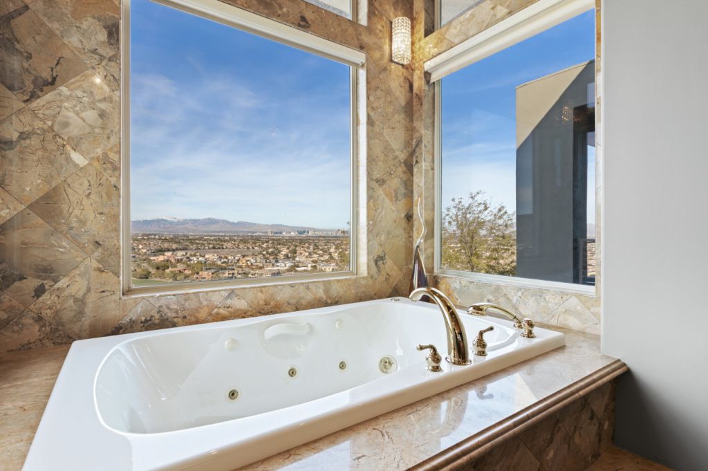 The Henderson House is a luxurious property with almost every room features unobstructed views now available for sale. This home located at 1508 View Field Ct, Henderson, Nevada; offering 4 bedrooms and 8 bathrooms with over 7,600 square feet of living spaces.