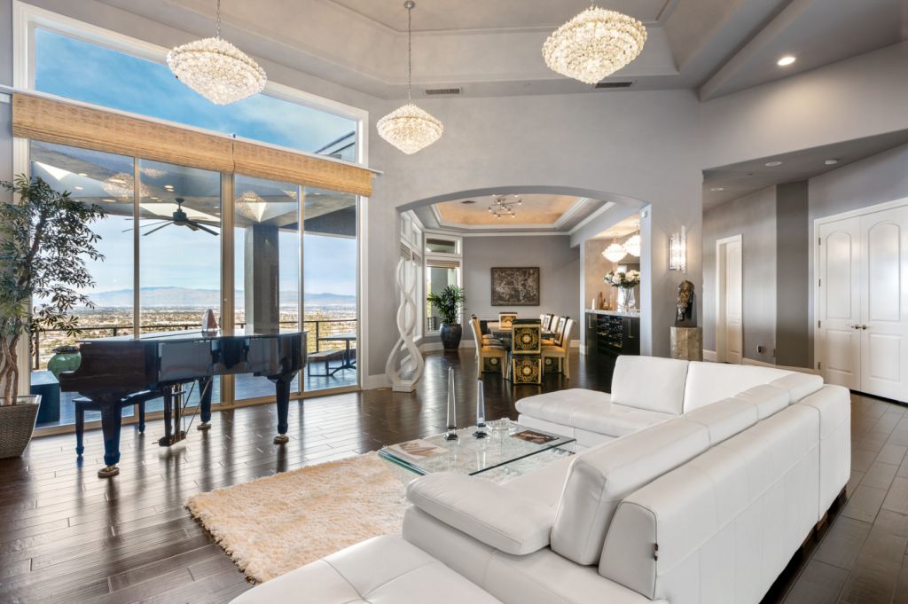 The Henderson House is a luxurious property with almost every room features unobstructed views now available for sale. This home located at 1508 View Field Ct, Henderson, Nevada; offering 4 bedrooms and 8 bathrooms with over 7,600 square feet of living spaces.