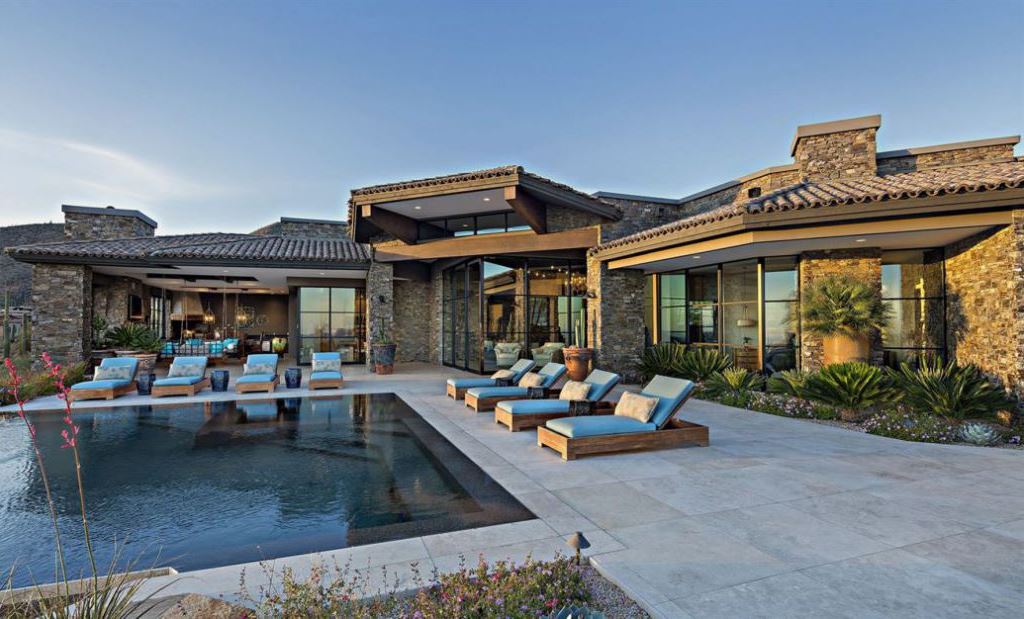 Mountain Home in Scottsdale, Arizona was designed by ArchitecTor in contemporary mountain style; this house offers the expansive desert and cityscape views from every room. This home located on beautiful lot with amazing views and wonderful outdoor living spaces including patio, pool, garden.