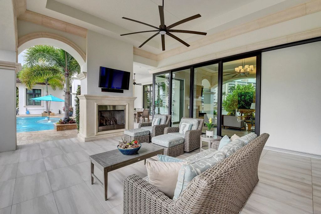 The Boca Raton House is an incredible Intracoastal estate features Resort style living with pool, outdoor kitchen and bar now available for sale. This home located at 7596 NE Orchid Bay Ter, Boca Raton, Florida; offering 5 bedrooms and 7 bathrooms with over 8,000 square feet of living spaces.