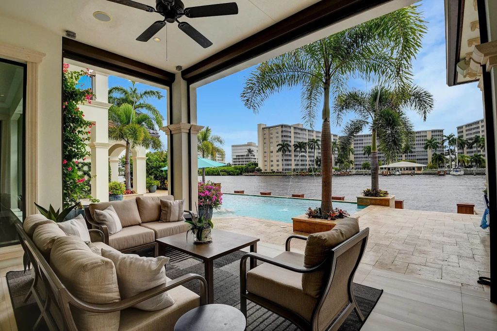 The Boca Raton House is an incredible Intracoastal estate features Resort style living with pool, outdoor kitchen and bar now available for sale. This home located at 7596 NE Orchid Bay Ter, Boca Raton, Florida; offering 5 bedrooms and 7 bathrooms with over 8,000 square feet of living spaces.