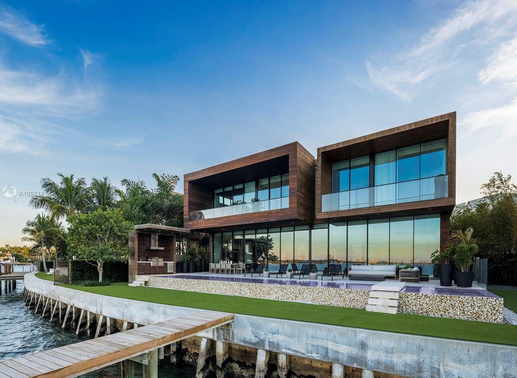 The Florida Mansion is a magnificent Venetian Islands estate with rich materials and bespoke details showcasing waterfront luxury living now available for sale. This home located at 835 E Di Lido Dr, Miami Beach, Florida; offering 7 bedrooms and 8 bathrooms with over 7,000 square feet of living spaces.