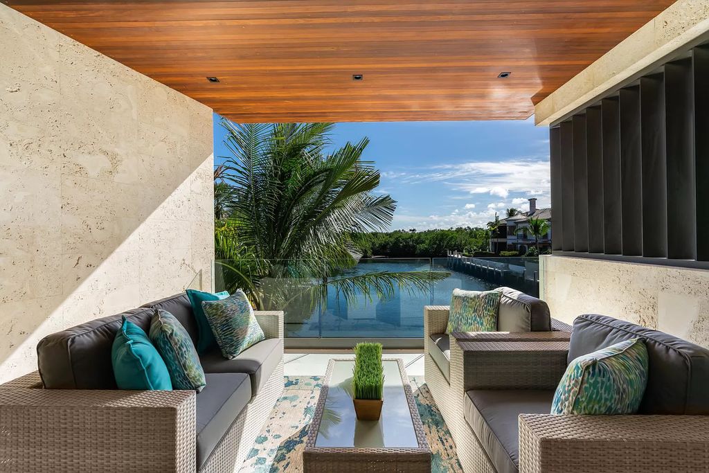 The Boca Raton House is an architectural deepwater estate in The Sanctuary with 3-levels of luxury and style now available for sale. This home located at 824 Pelican Point Cv, Boca Raton, Florida; offering 7 bedrooms and 10 bathrooms with over 7,300 square feet of living spaces.
