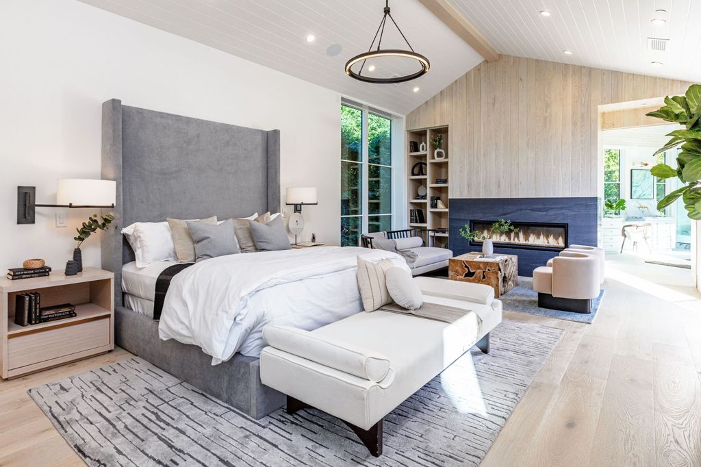 The Contemporary Farmhouse is a luxurious home invites nature and incredible sunlight into every room now available for sale. This home located at 1054 Angelo Dr, Los Angeles, California; offering 6 bedrooms and 8 bathrooms with over 10,500 square feet of living spaces.