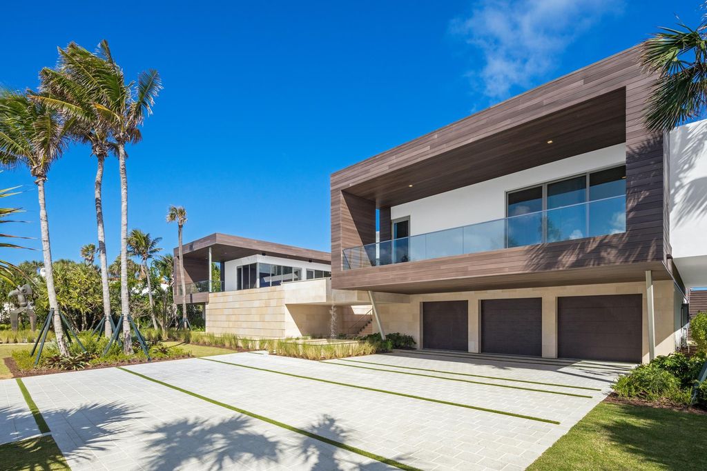 The Modern Mansion in Jupiter Island features spacious living and entertaining spaces with the most panoramic views of the Ocean now available for sale. This home located at 609 S Beach Rd, Jupiter, Florida; offering 6 bedrooms and 9 bathrooms with over 11,700 square feet of living spaces.