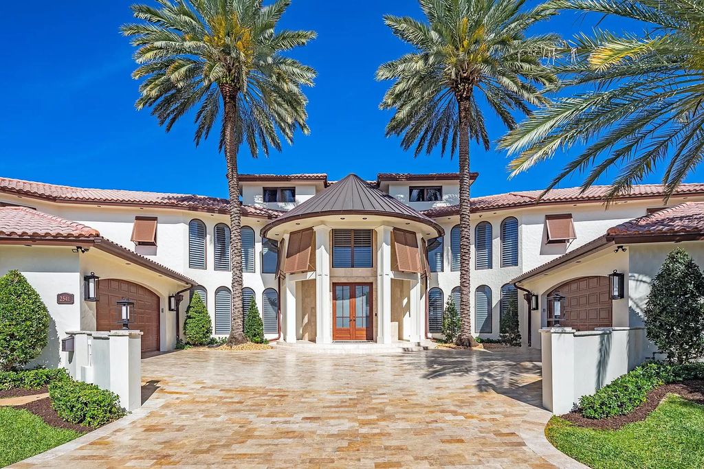 The Home in Lighthouse Point is an exceptional gated estate tucked away on a quiet cul-de-sac offering ultimate privacy now available for sale. This home located at 2541 NE 32nd Ct, Lighthouse Point, Florida; offering 6 bedrooms and 7 bathrooms with over 8,100 square feet of living spaces.