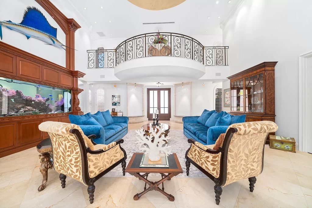 The Home in Lighthouse Point is an exceptional gated estate tucked away on a quiet cul-de-sac offering ultimate privacy now available for sale. This home located at 2541 NE 32nd Ct, Lighthouse Point, Florida; offering 6 bedrooms and 7 bathrooms with over 8,100 square feet of living spaces.