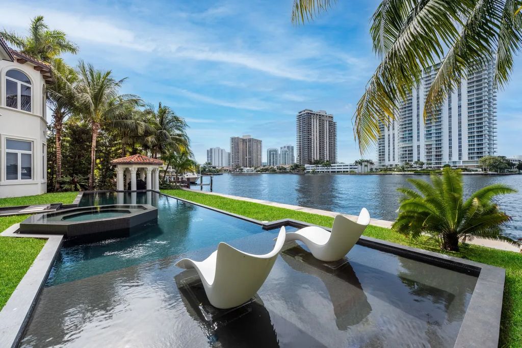 The Waterfront Home is a luxurious home in one of South Florida’s most exclusive gated communities now available for sale. This home located at 170 S Is, Golden Beach, Florida; offering 7 bedrooms and 9 bathrooms with over 8,800 square feet of living spaces.