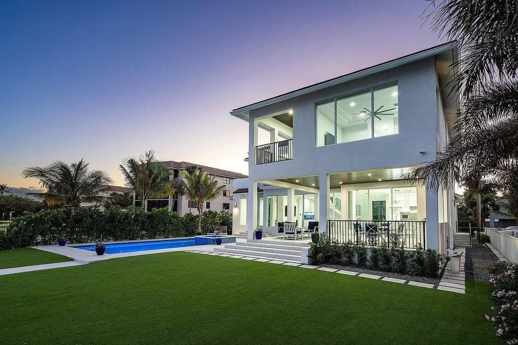 The Coastal Contemporary Home is an intracoastal estate boasting elegance, clean lines, walls of floor to ceiling glass with unobstructed views now available for sale. This home located at 2505 Lake Dr N, Boynton Beach, Florida; offering 4 bedrooms and 5 bathrooms with over 5,000 square feet of living spaces.