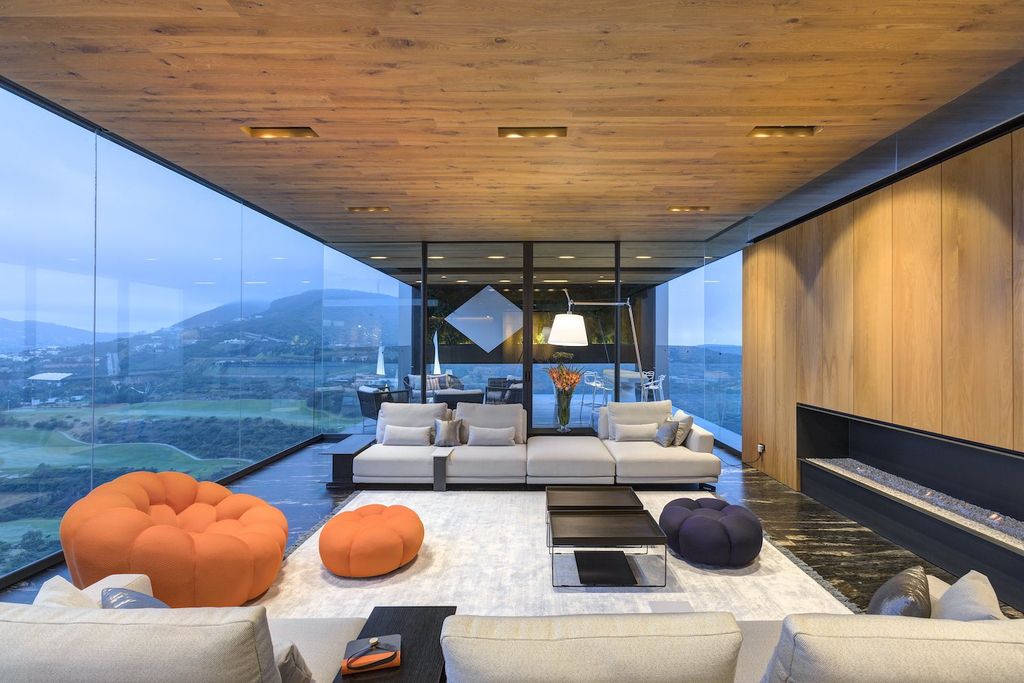 La Roca Home in Mexico was designed by RRZ Arquitectos in Modern style  offers a luxurious living of 1,500 square meter on a rocky hill with great views from every corner. This home located on wonderfully unique 7,500 square meter lot with amazing 360 degree views and incredible outdoor living spaces including patio, pool, garden.