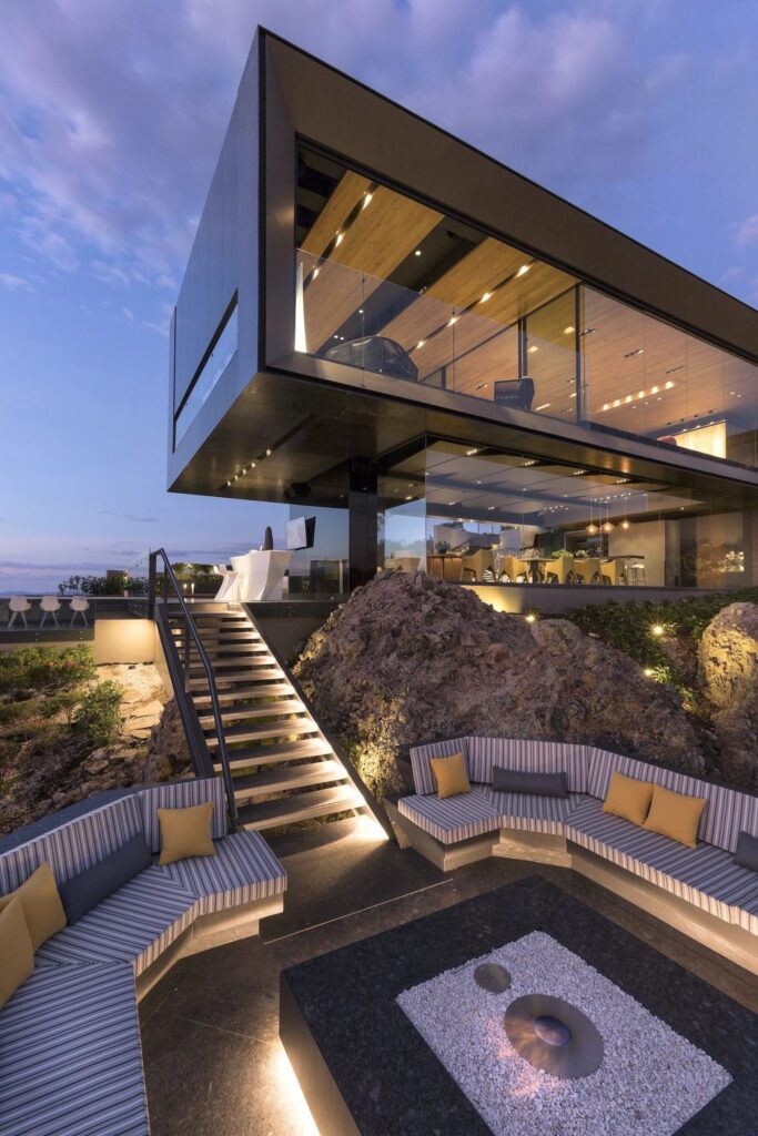 La Roca Home in Mexico was designed by RRZ Arquitectos in Modern style  offers a luxurious living of 1,500 square meter on a rocky hill with great views from every corner. This home located on wonderfully unique 7,500 square meter lot with amazing 360 degree views and incredible outdoor living spaces including patio, pool, garden.