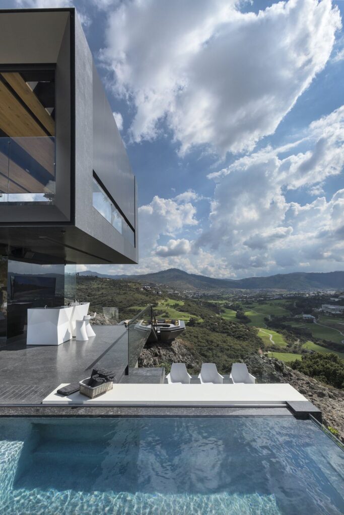 La Roca Home in Mexico was designed by RRZ Arquitectos in Modern style  offers a luxurious living of 1,500 square meter on a rocky hill with great views from every corner. This home located on wonderfully unique 7,500 square meter lot with amazing 360 degree views and incredible outdoor living spaces including patio, pool, garden.