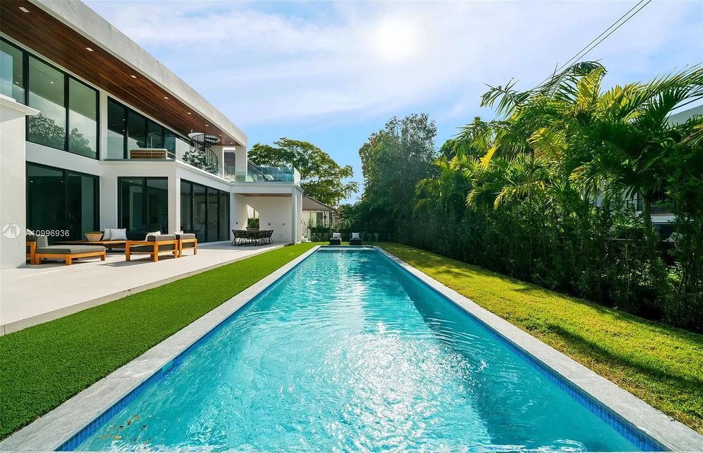 The Home in Miami Beach is a new construction modern oasis located on guard gated Hibiscus Island now available for sale. This home located at 112 W Palm Midway, Miami Beach, Florida; offering 5 bedrooms and 6 bathrooms with over 4,400 square feet of living spaces.