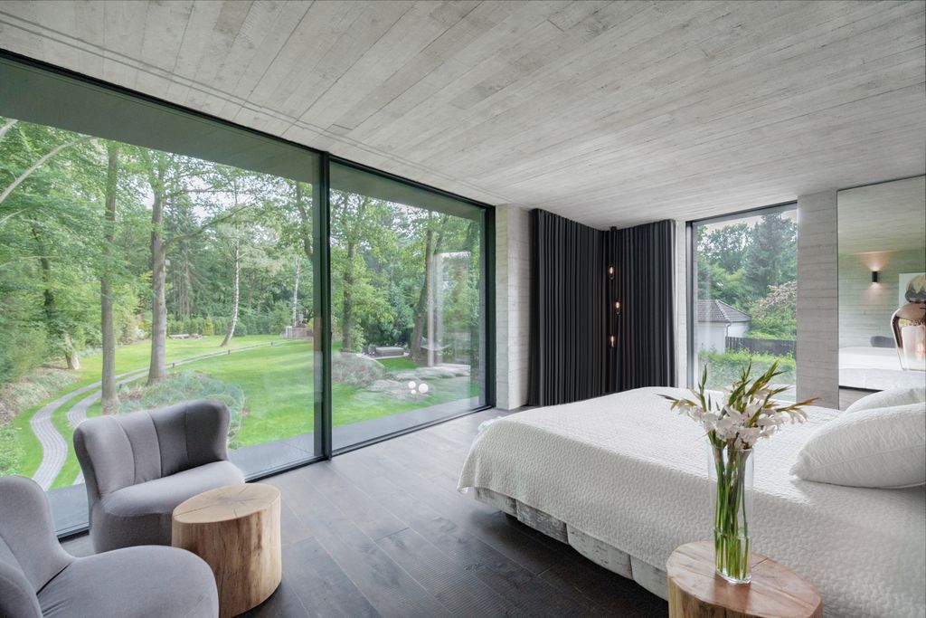 Villa NEO House in Germany was designed by Querkopf Architekten with the concept for an incomparable sense of living in the midst of nature. This house offers a high degree of privacy and protection. 