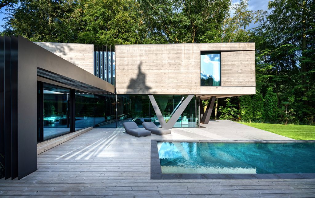 Villa NEO House in Germany was designed by Querkopf Architekten with the concept for an incomparable sense of living in the midst of nature. This house offers a high degree of privacy and protection. 