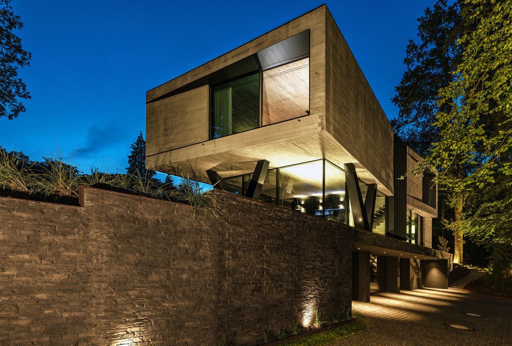 Villa NEO House in Germany was designed by Querkopf Architekten with the concept for an incomparable sense of living in the midst of nature. This house offers a high degree of privacy and protection. 