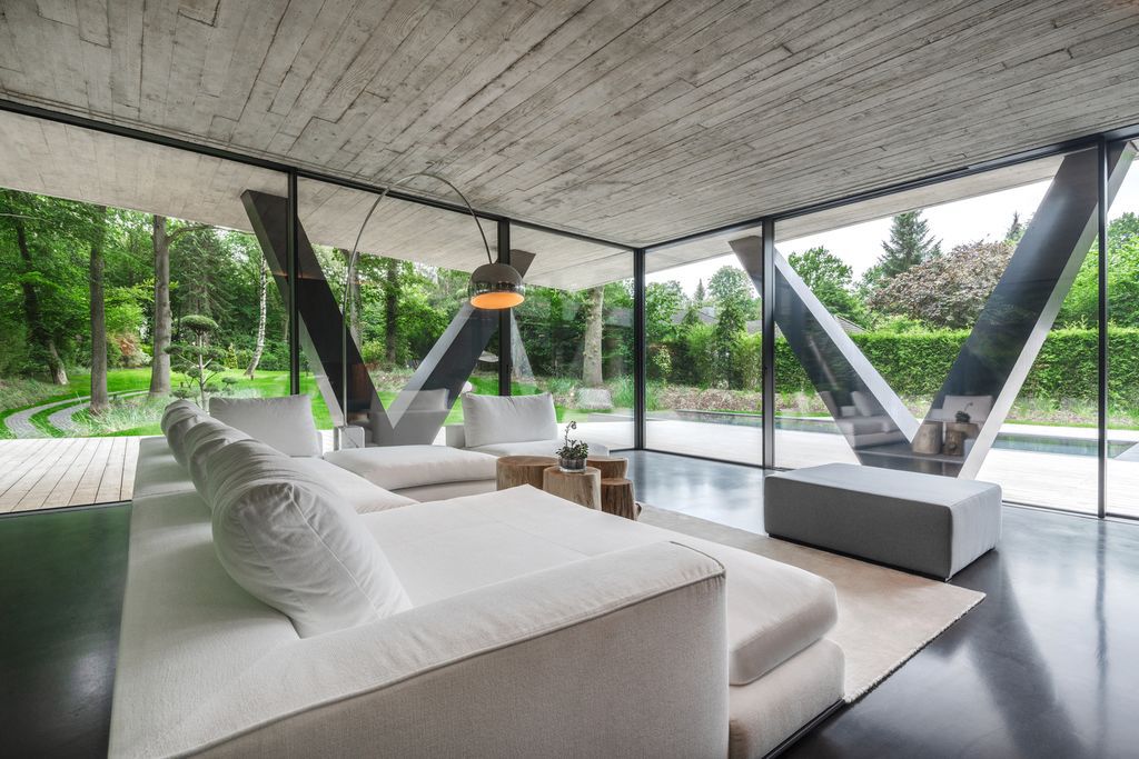 Villa NEO House in Germany was designed by Querkopf Architekten with the concept for an incomparable sense of living in the midst of nature. This house offers a high degree of privacy and protection. 