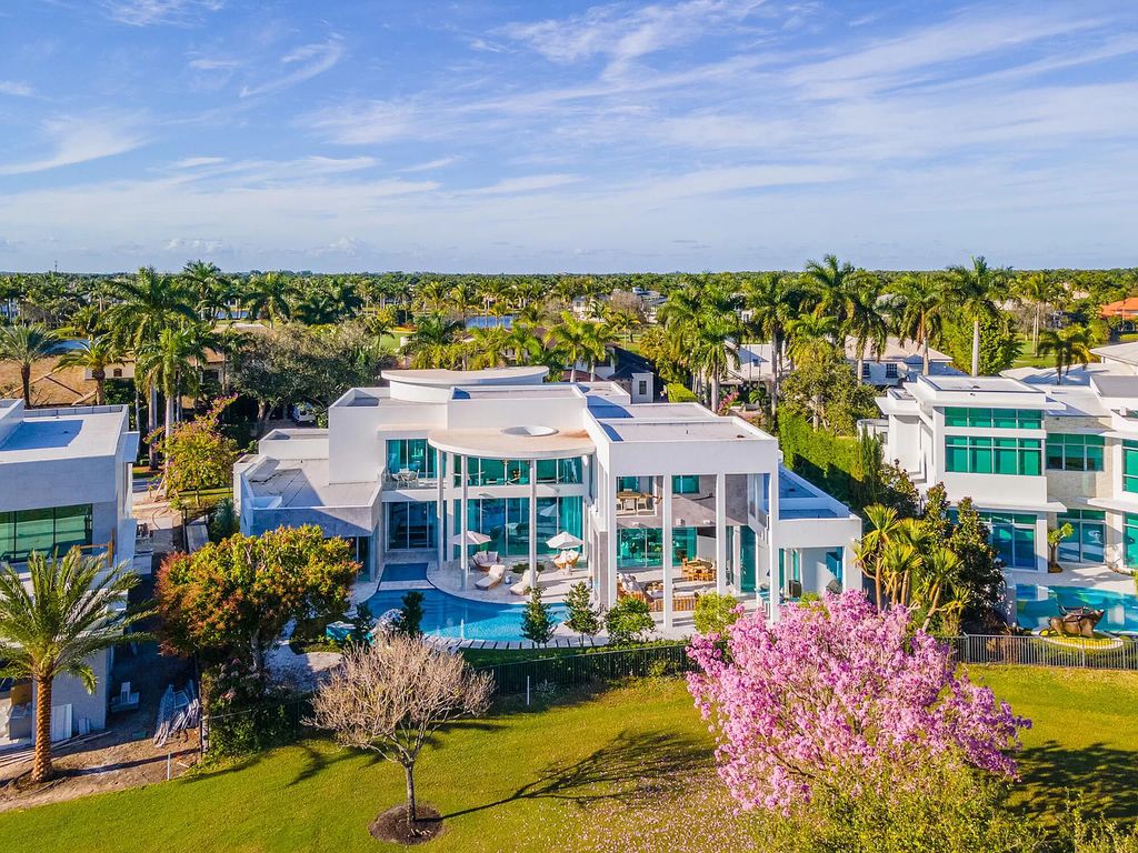 The Boca Raton Home is a South African inspiration and dramatic contemporary design now available for sale. This home located at 7170 Ayrshire Ln, Boca Raton, Florida; offering 4 bedrooms and 7 bathrooms with over 7,500 square feet of living spaces.