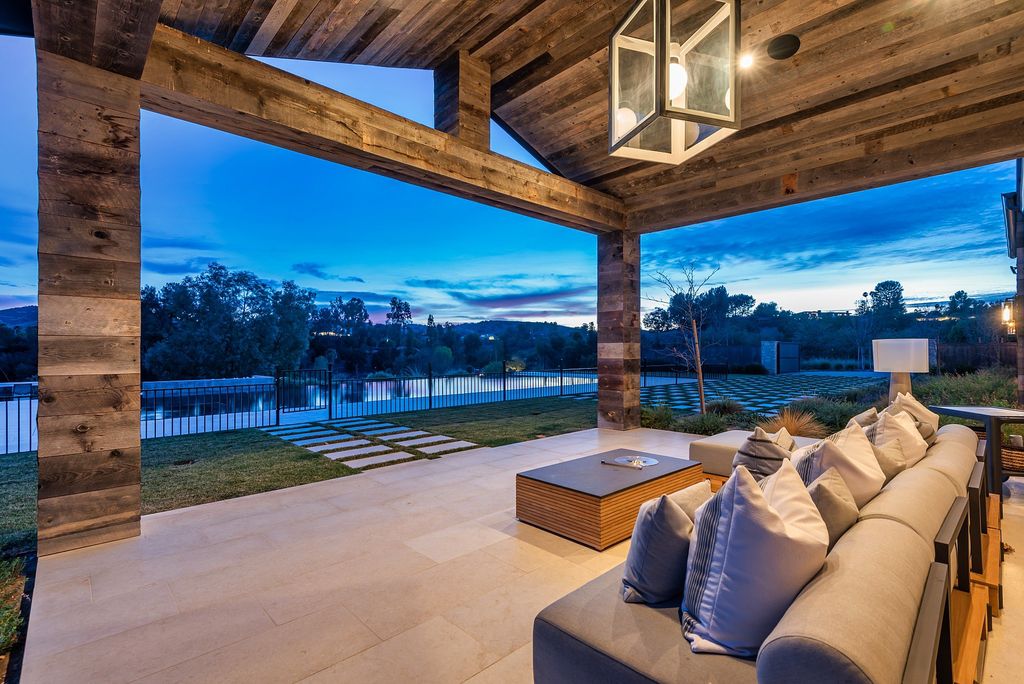 The California Property is an extraordinary newer rustic contemporary Farmhouse with explosive panoramic views now available for sale. This California Property located at 5521 Paradise Valley Rd, Hidden Hills, California; offering 6 bedrooms and 11 bathrooms with over 14,500 square feet of living spaces.