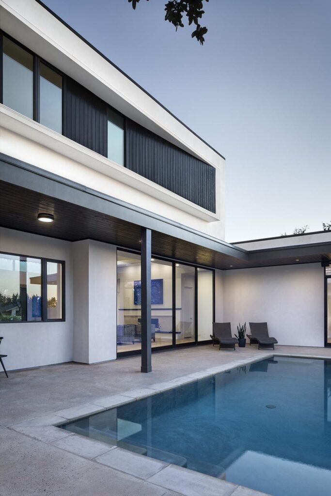 Lakeway House in Austin was designed by Clark Richardson Architects in Modern style with 3 bedrooms and 4 bathrooms on a gently sloping site; The long open floor plan, tall ceilings with ample glazing, and the courtyard parti all work in harmony with passive solar principles and prevailing breezes to allow for an efficient green design