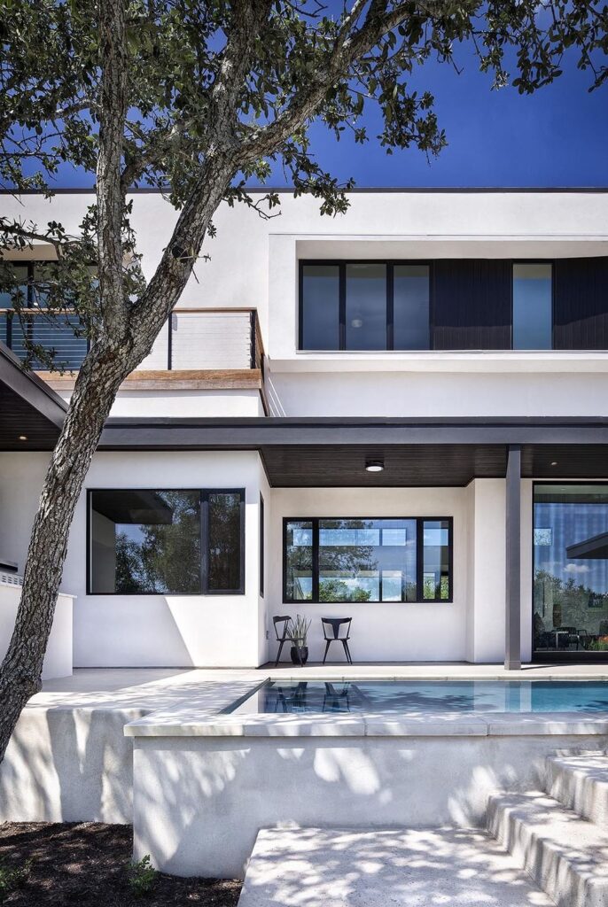 Lakeway House in Austin was designed by Clark Richardson Architects in Modern style with 3 bedrooms and 4 bathrooms on a gently sloping site; The long open floor plan, tall ceilings with ample glazing, and the courtyard parti all work in harmony with passive solar principles and prevailing breezes to allow for an efficient green design