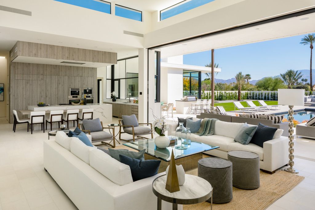 Interior design of Makena Home in Rancho Mirage, California was made by Meridith Baer Home in Modern style. This design creates functionally spacious indoor living from good finish materials, with impressive decorations and smart amenities