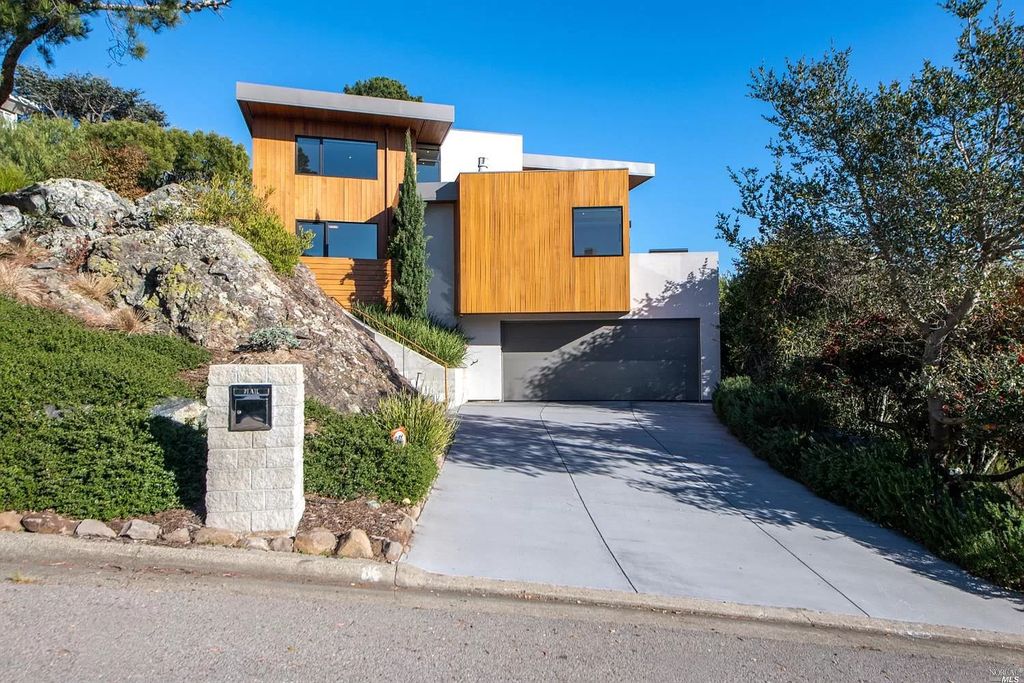 The Tiburon Home is a luxurious residence on one of the most desirable streets with sweeping views now available for sale. This home located at 86 Sugarloaf Dr, Tiburon, California; offering 5 bedrooms and 4 bathrooms with over 4,000 square feet of living spaces.