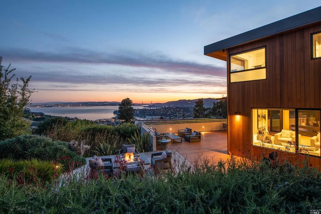 The Tiburon Home is a luxurious residence on one of the most desirable streets with sweeping views now available for sale. This home located at 86 Sugarloaf Dr, Tiburon, California; offering 5 bedrooms and 4 bathrooms with over 4,000 square feet of living spaces.