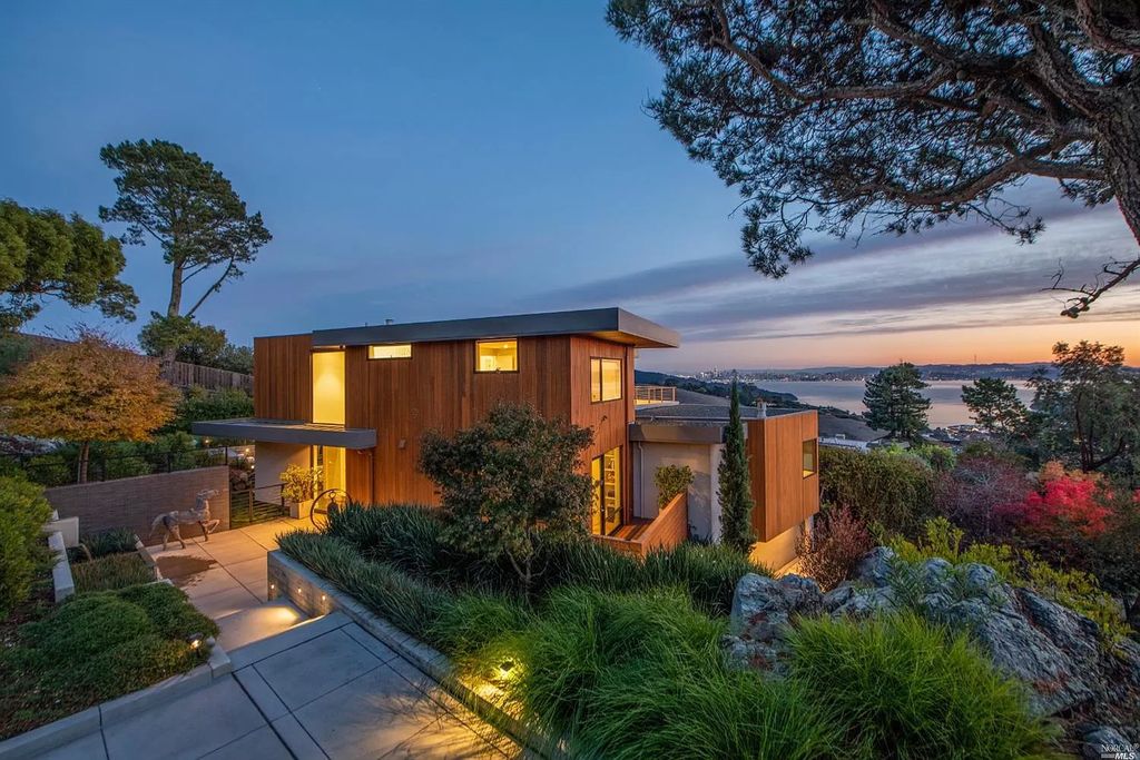 The Tiburon Home is a luxurious residence on one of the most desirable streets with sweeping views now available for sale. This home located at 86 Sugarloaf Dr, Tiburon, California; offering 5 bedrooms and 4 bathrooms with over 4,000 square feet of living spaces.