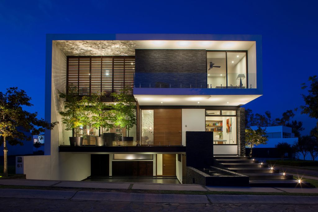 The GM House in Mexico was designed by GLR Architects in Modern style located on a corner in front of the access park of new urban area; this house offers luxurious living with high end finishes and smart amenities.