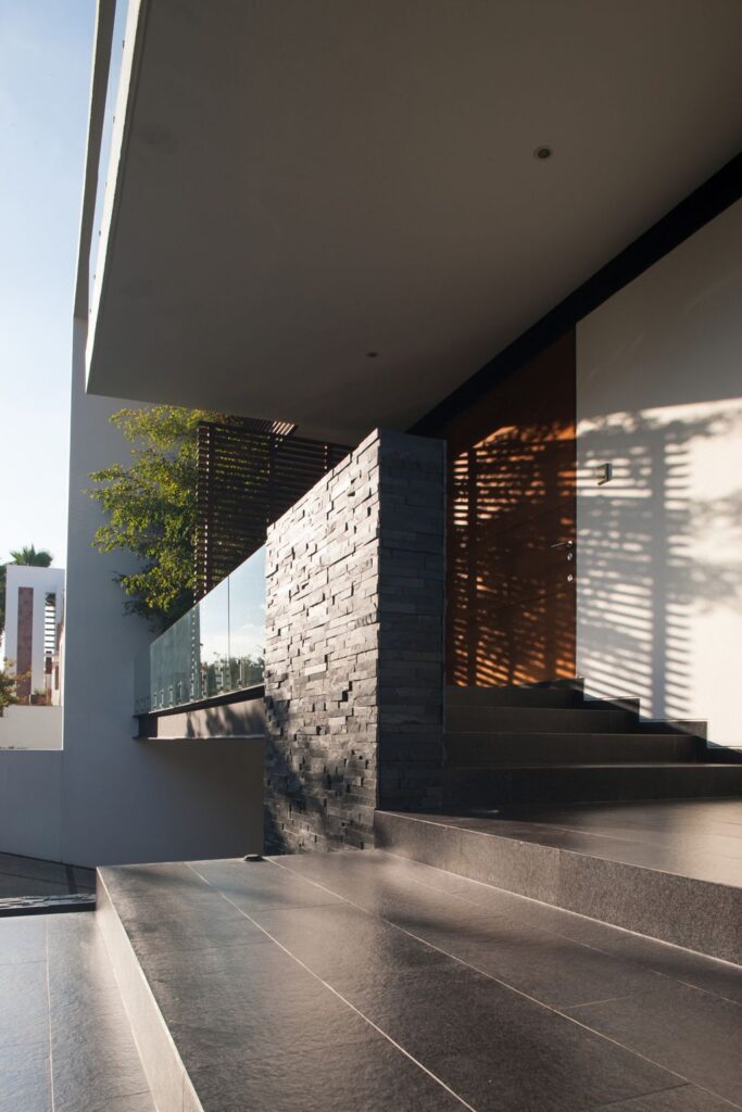 The GM House in Mexico was designed by GLR Architects in Modern style located on a corner in front of the access park of new urban area; this house offers luxurious living with high end finishes and smart amenities.