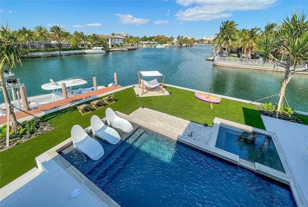 The Waterfront Home is a fully furnished smart residence with nice water views now available for sale. This home located at 2213 Keystone Blvd, North Miami, Florida; offering 5 bedrooms and 6 bathrooms with over 6,200 square feet of living spaces.